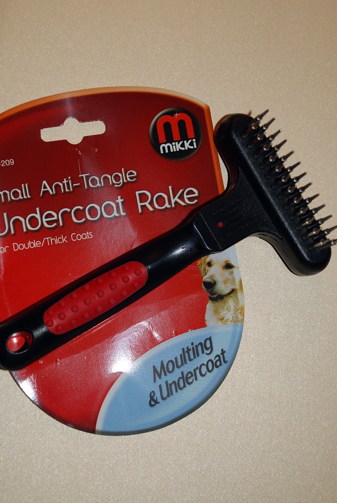 Slicker Brush vs Deshedding Tool: Which Is Better for Dog Shedding?
